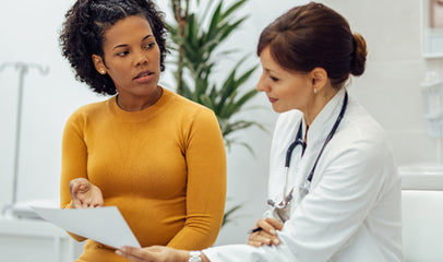 woman discussing AMH test with doctor