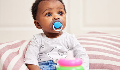 baby on nursing strike with pacifier in mouth