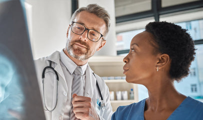 doctor examining x-rays for brain injury