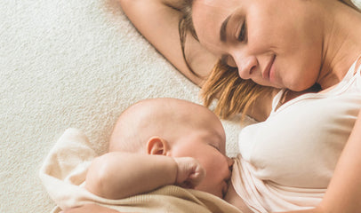 mom breastfeeding baby