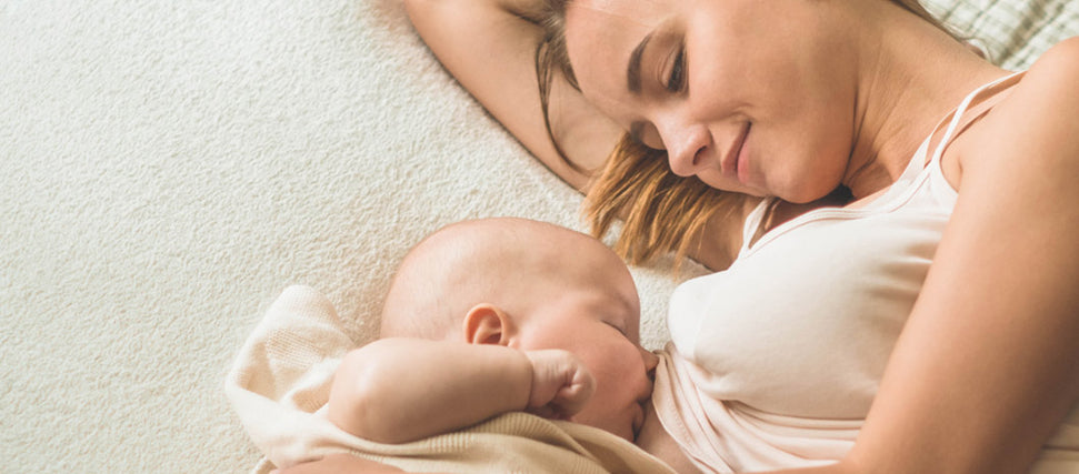 mom breastfeeding baby