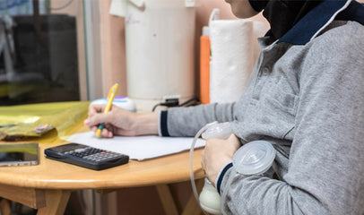 woman breastfeeding at work