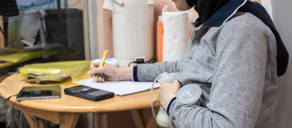 woman breastfeeding at work