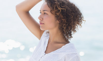 woman posing on the beach