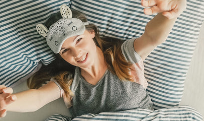 woman waking up after a restful sleep